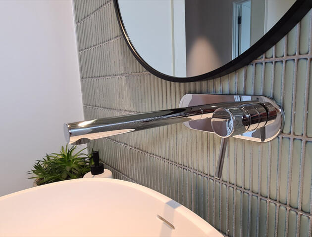 Sink and tapware in Phelan architectural home built by Michael Limb Builders