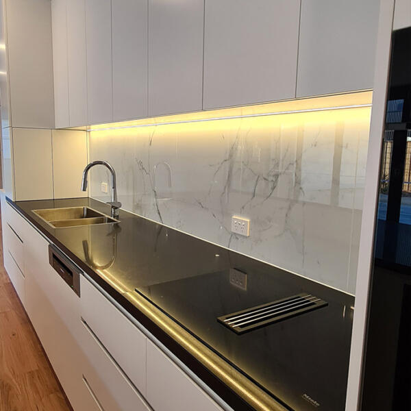 Kitchen in rammed earth home built by Michael Limb Builders, Point Lonsdale