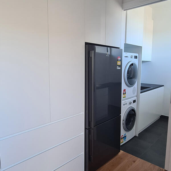 Laundry in rammed earth home built by Michael Limb Builders, Point Lonsdale