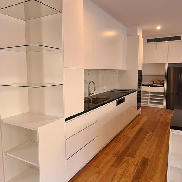 Kitchen in rammed earth home built by Michael Limb Builders, Point Lonsdale